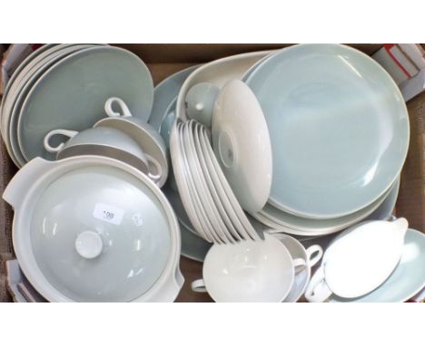 A Poole pottery green dinner  service comprising:- two tureens, three graduated meat plates, ten dinner plates, six soup bowl