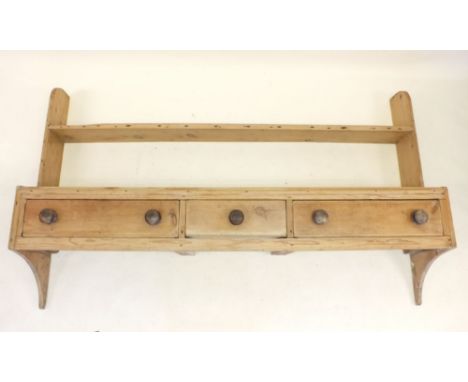 A Victorian pine wall dresser with display shelf over three drawers - 176cm wide