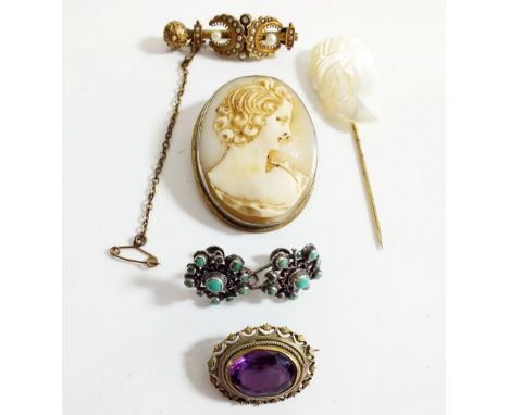 A group of three antique brooches, earrings and a stick pin