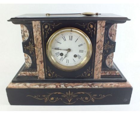A Victorian architectural style slate mantel clock