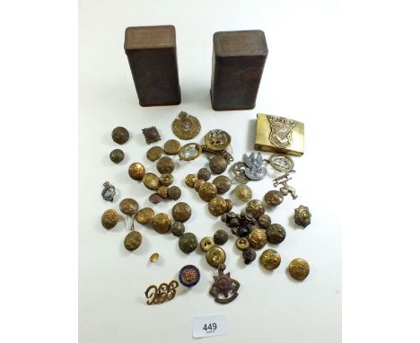 Two tins of army buttons, cap badges, buckle etc