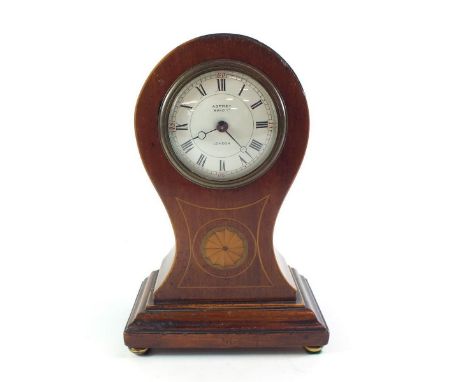 An early 20th Century mahogany balloon form mantel clock with decorative inlay, retailed by Aspreys, 18cm