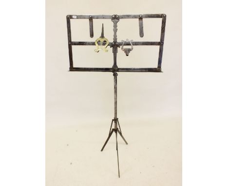 An early 20th century music stand and two lyre form music clips - please note this item does not fold at all so cannot be pos