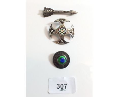 A silver Celtic brooch with Millefiori glass centre by C.G and two white metal brooches