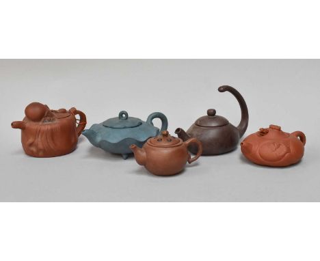 Five Chinese Yixing Stoneware Teapots, one formed as a sleeping man, impressed seal marks (5)