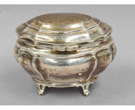 An Edward VII Silver Tea-Caddy, by Charles Stuart Harris, London, 1903, tapering oval and on four panel feet, with part flute