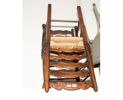 Set of four Lancashire style ladder back dining room chairs with rush seats 