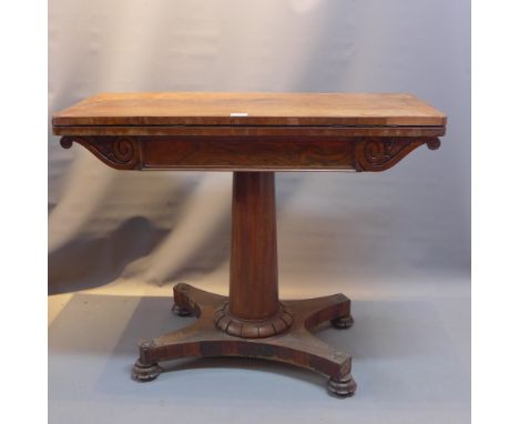 A William IV rosewood card table with fluted column support, raised on quatraform base and castors. H-73cm, W-92cm, D-45cm  