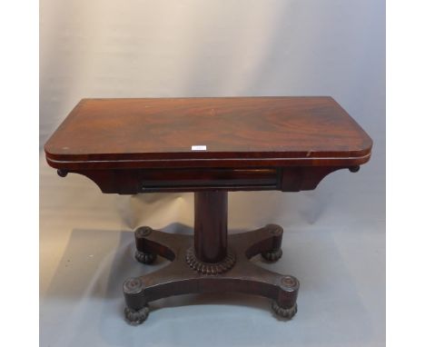 A William IV flame mahogany card table raised on quadnaturm base and castors