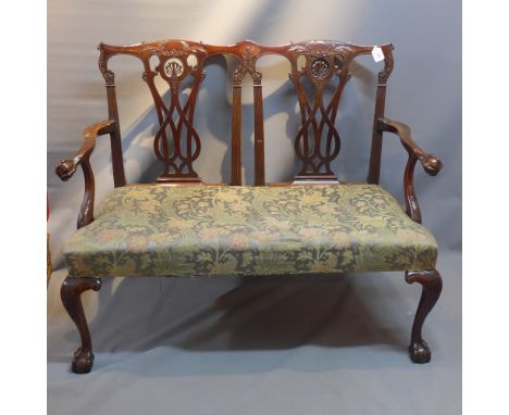 An early 20th Century Chippendale style open hall chair.