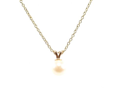 A hallmarked 9ct yellow gold chain necklace and pendant. The chain comprised of fine cable links united by a spring ring clas