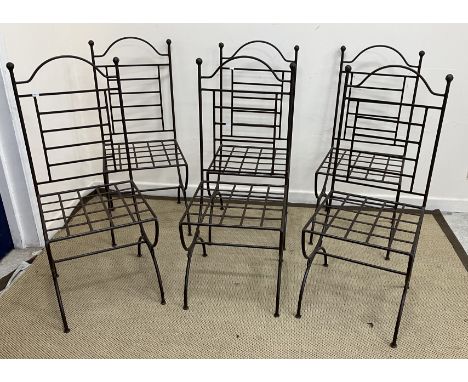 A set of six Moroccan wrought iron ladder back lattice seat garden chairs, 43 cm wide x 44 cm deep x 103 cm high