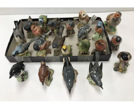 A collection of 20 various Beswick bird figurines to include "Barn Owl", "Kingfisher", "Stone Chat" (No. 2274), "Chaffinch" (