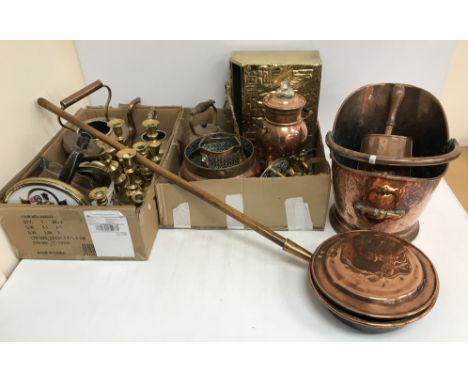 Two boxes of assorted copper and brass wares to include kettles, jardiniere, bottle coaster, Arts & Crafts type chamber stick