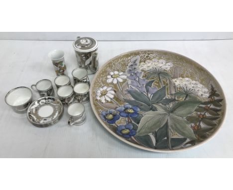 An A.E. Gray silver lustre ware part coffee service comprising coffee pot, milk jug, sugar bowl and five cups and saucers tog
