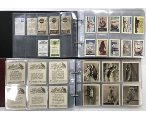 Two albums of mainly R & J Hill Ltd cigarette cards but including a full set of 30 circa 1900 sepia photograph portrait studi