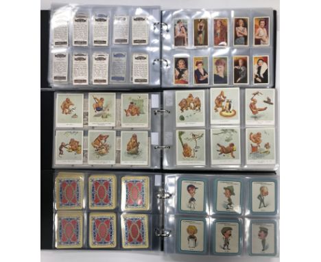 Three albums of Carreras Ltd cigarette cards circa 1914-1945 including Black Cat Science of Boxing series 1914 (x 5), Raemaek