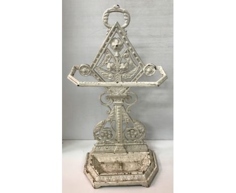 A Victorian Aesthetic period white painted cast iron stick stand with lozenge and floral spray decorated back, 37.5 cm wide x
