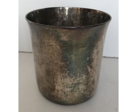 An 18th Century Irish silver beaker of plain cylindrical form with shallow flared rim (bears Dublin harp, Britannia and J L m