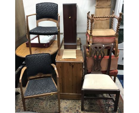 Two Art Deco walnut elbow chairs, a pine oval kitchen table, plastic framed mirror, Ducal pine double pedestal dressing table