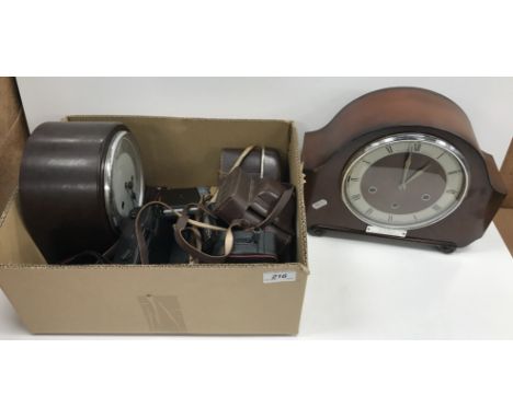 A collection of cameras to include an Ilford Sportsman and an Ilford Sporti 4 etc together with an Enfield Bakelite mantel cl