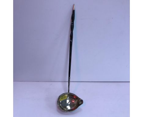 A Georgian silver and whale bone punch ladle (by Solomon Hougham, London 1792), 32 cm long 