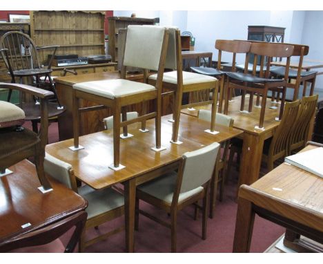 Russell of Broadway Dining Table, Chairs, with a rectangular top (extra leaf) on tapering supports; together with six chairs 