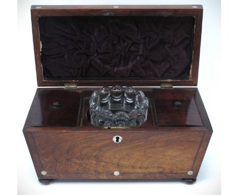 XIX Century rosewood tea caddy, sarcophagus shaped mother of pearl circular inserts, on bun feet, 30cm w.