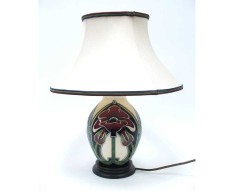 A Moorcroft table lamp decorated in the 'Petal Dome' designed by Rachel Bishop, complete with original Moorcroft shade on woo