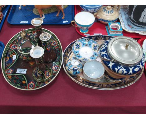 A Noritake Dressing Table Set, with candlesticks, hat pin holder, ring holder and trinket pot; A Noritake Desert Scene tray, 