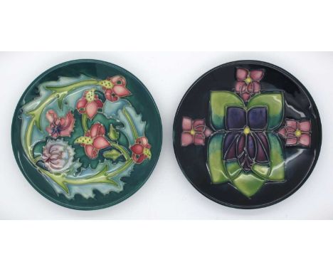 Two Moorcroft Pin Trays, 'Leicester' dated '95 and 'Violet', both 12cm diameter. (2)Leicester with a couple of light crazing 