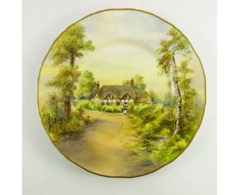 Nicholls for Royal Worcester, a painted and transfer decorated plate, Ripple, signed, 27.5cm diameter