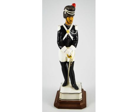 A Royal Worcester model of a Gendarme from the papal series, 'Gendarme of the Dendarmeria Pontificia' 1956,  modelled by Neal