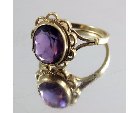 A Victorian amethyst and 9 carat gold ring, Birmingham 1899, approx. size M