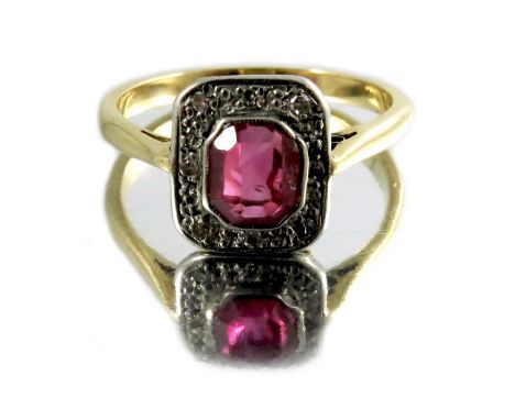 A ruby and diamond ring, on 18 carat gold band, set in platinum, Art Deco style, circa 1920, approx. size L 1/2