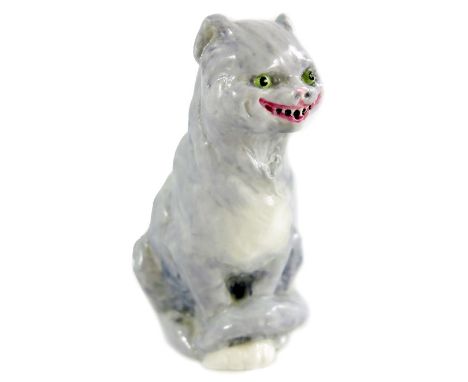 F Doughty for Royal Worcester, a Cheshire Cat figure, 1959, model 3609, 8.5cm high