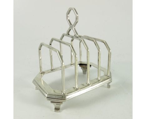 A George VI silver toast rack, Arthur Machan and Co., London 1936, four section, geometric form with octagonal ring handle, o