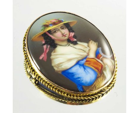 A 9ct yellow gold and enamel oval brooch/pendant, with portrait painted in coloured enamels of a lady in a florally decorated