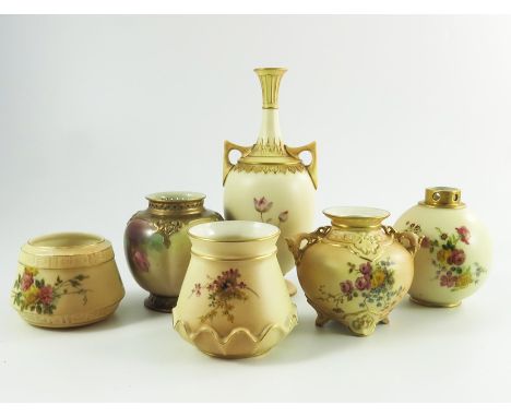 A collection of Royal Worcester blush ivory vases and a rose painted vase, various dates and shapes, including twin handled b