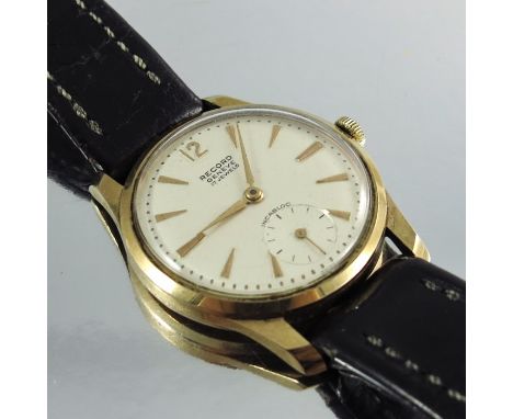 A 9 carat gold Record gents wristwatch, champagne dial with subsidiary seconds, manual wing, black leather strap, 3.5cm diame