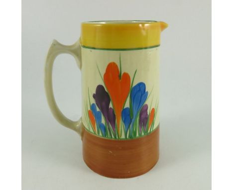 Clarice Cliff for Wilkinson, a Crocus jug, conical form, printed Bizarre marks, 15cm high