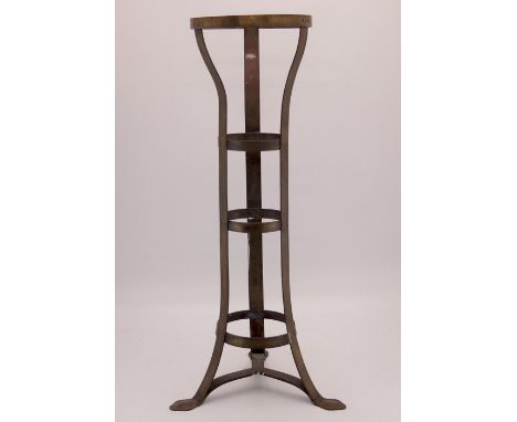 Arthur Stansfeld Dixon for Birmingham Guild of Handicraft, an Arts and Crafts brass jardinière stand, riveted strap and ring 