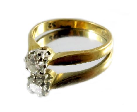 An 18 carat gold diamond solitaire ring, approximately a quarter carat weight, ring size approx. J