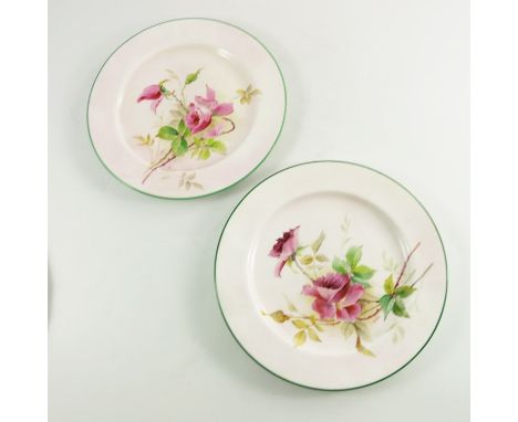 William Hale for Royal Worcester, a pair of rose painted plates, 1925, on pink grounds with green borders, 25.5cm diameter (2