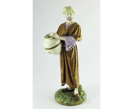 James Hadley for Royal Worcester, a water carrier figure, 1884, modelled in Middle Eastern costume carrying a ewer, hand pain