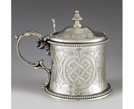 William Evans, London 1864, a Victorian silver mustard pot, slightly flared cylindrical form, etched and engraved celtic knot