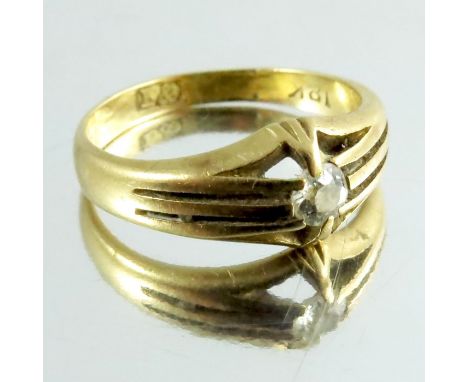 A diamond solitaire ring, on 18 carat gold, approx size H or I