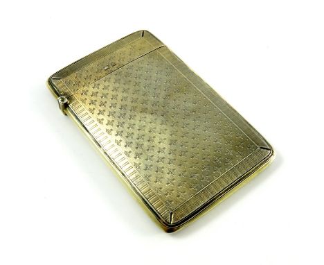 An Edwardian silver gilt card case, Birmingham 1906, engine turned, geometric stripe and diamond design to one side, the othe