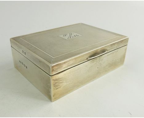 An Elizabeth II silver cigarette box, John Rose, Birmingham 1970, cuboid form, engine turned lid, cedar lined, 11.5cm wide, 4