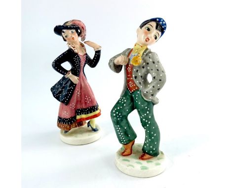 A pair of Goebel Hummel figures, pearly boy and girl, painted and jewelled, 14.5cm high (2)